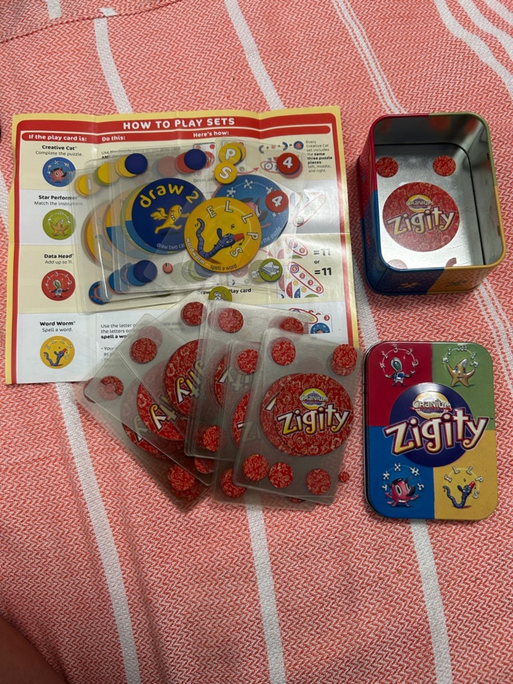 Cranium ZIGITY Card Game 77 Cards with Tin and Instructions